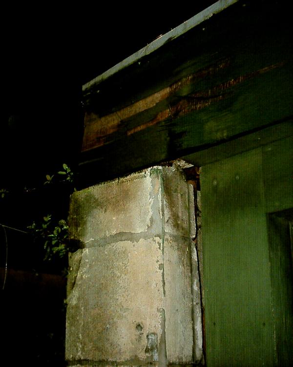 Damage to top of wall, gap to garage door