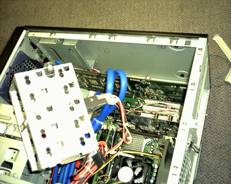 Removal of drive mounting bay